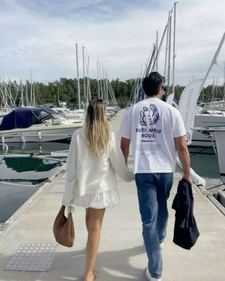 Curated luxury gift hamper for couples featuring Astier de Villatte candle, Laurent-Perrier champagne, coupe glasses, truffles, and coffee table books