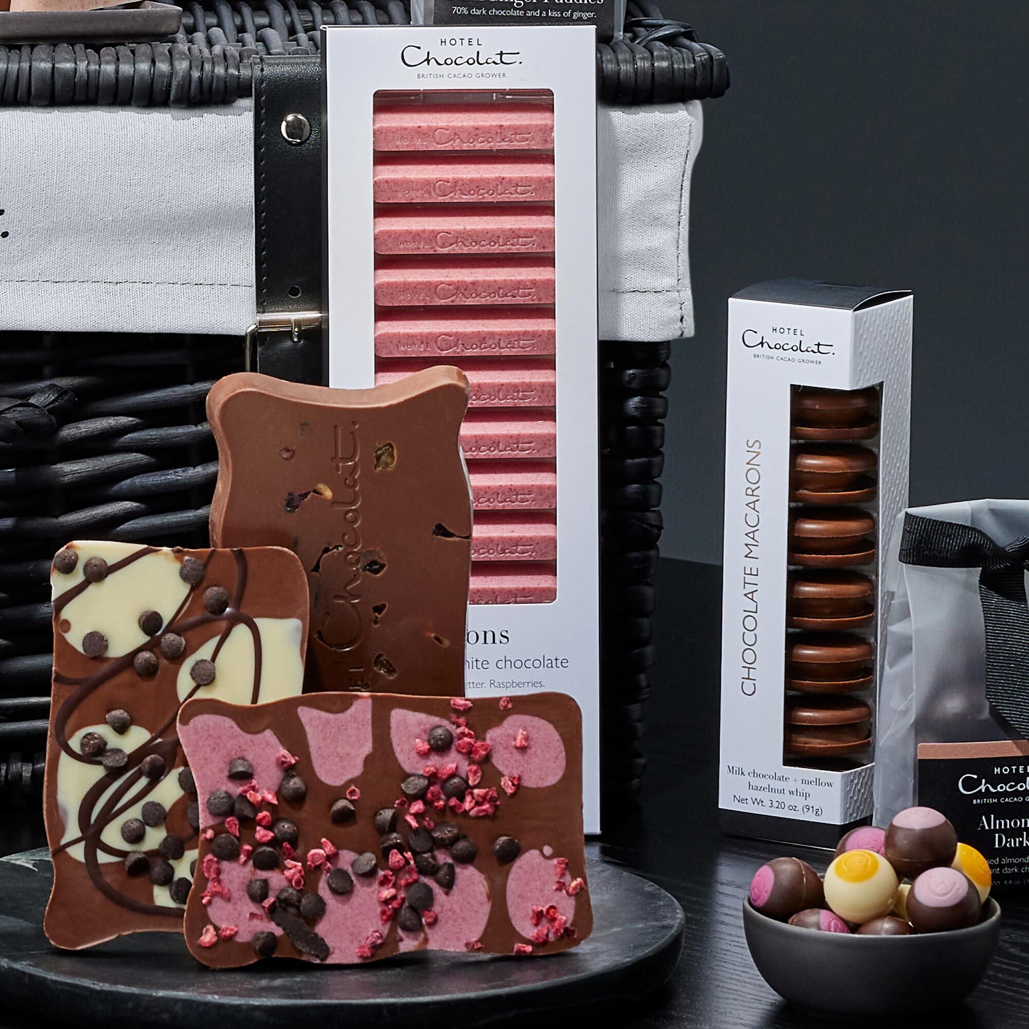 Hotel Chocolat Chocolate Adventurer's Hamper with 19 items including sleeksters slabs and macarons in wicker hamper
