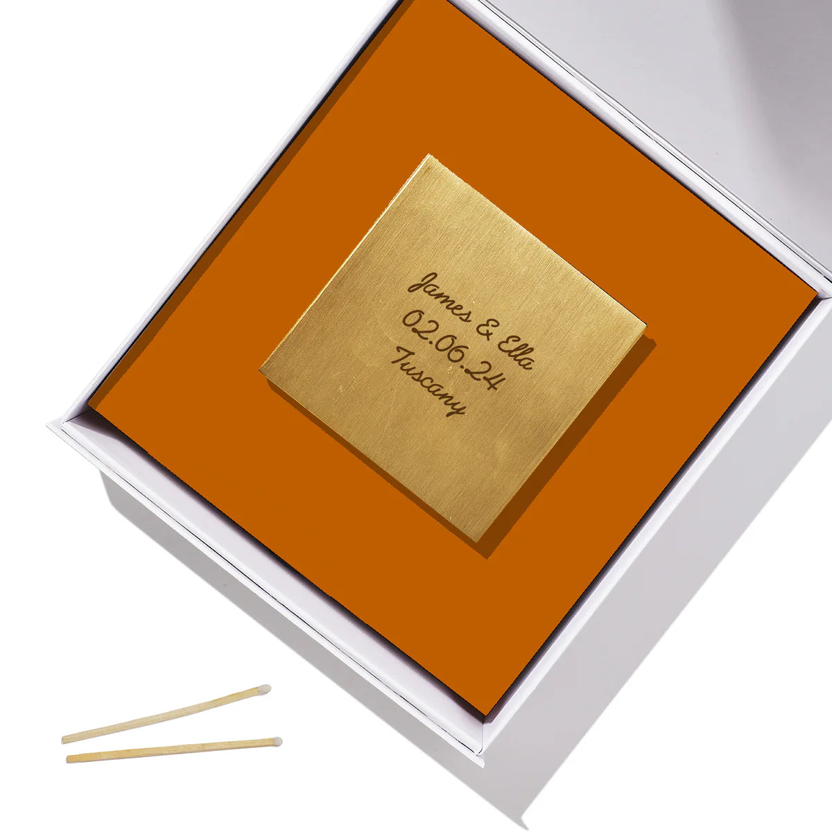 Large brass matchbox cover on desk sophisticated client gift