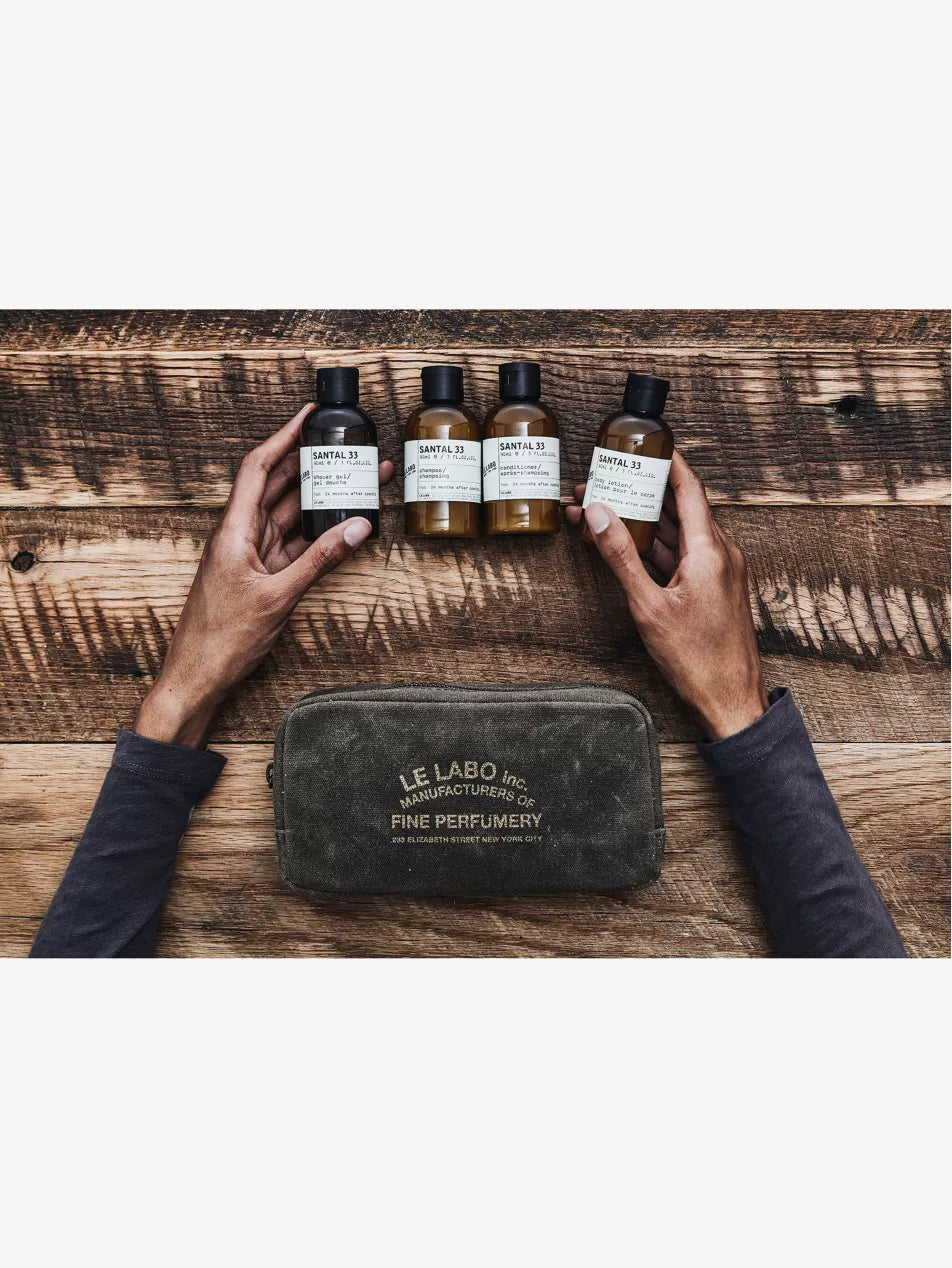 Le Labo waxed canvas travel pouch stamped Manufacturers of Fine Perfumery