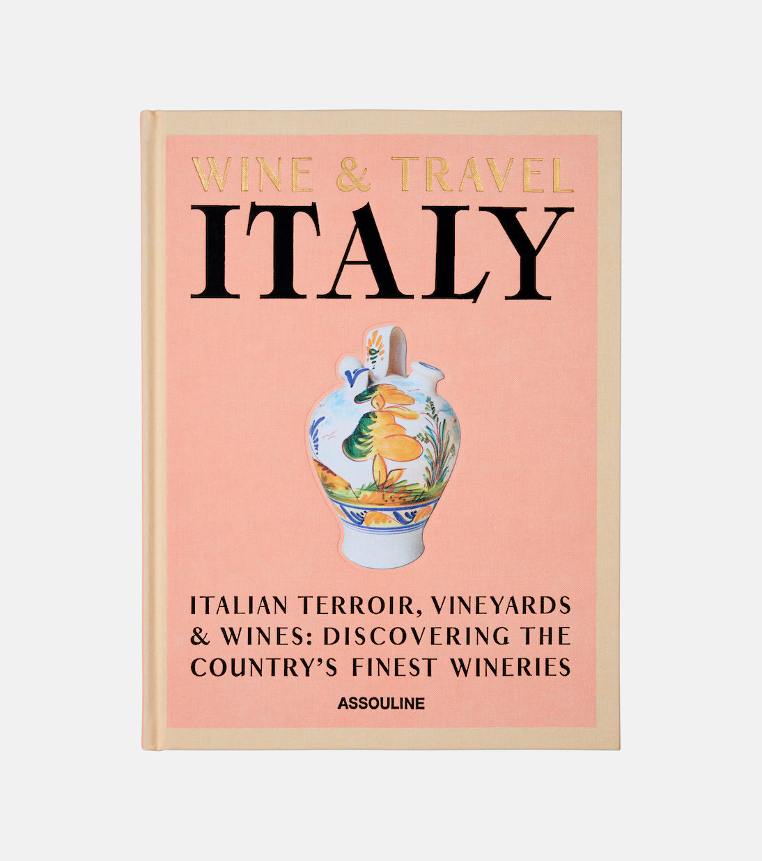 Book cover of 'Wine & Travel Italy' by Assouline on a light pink background