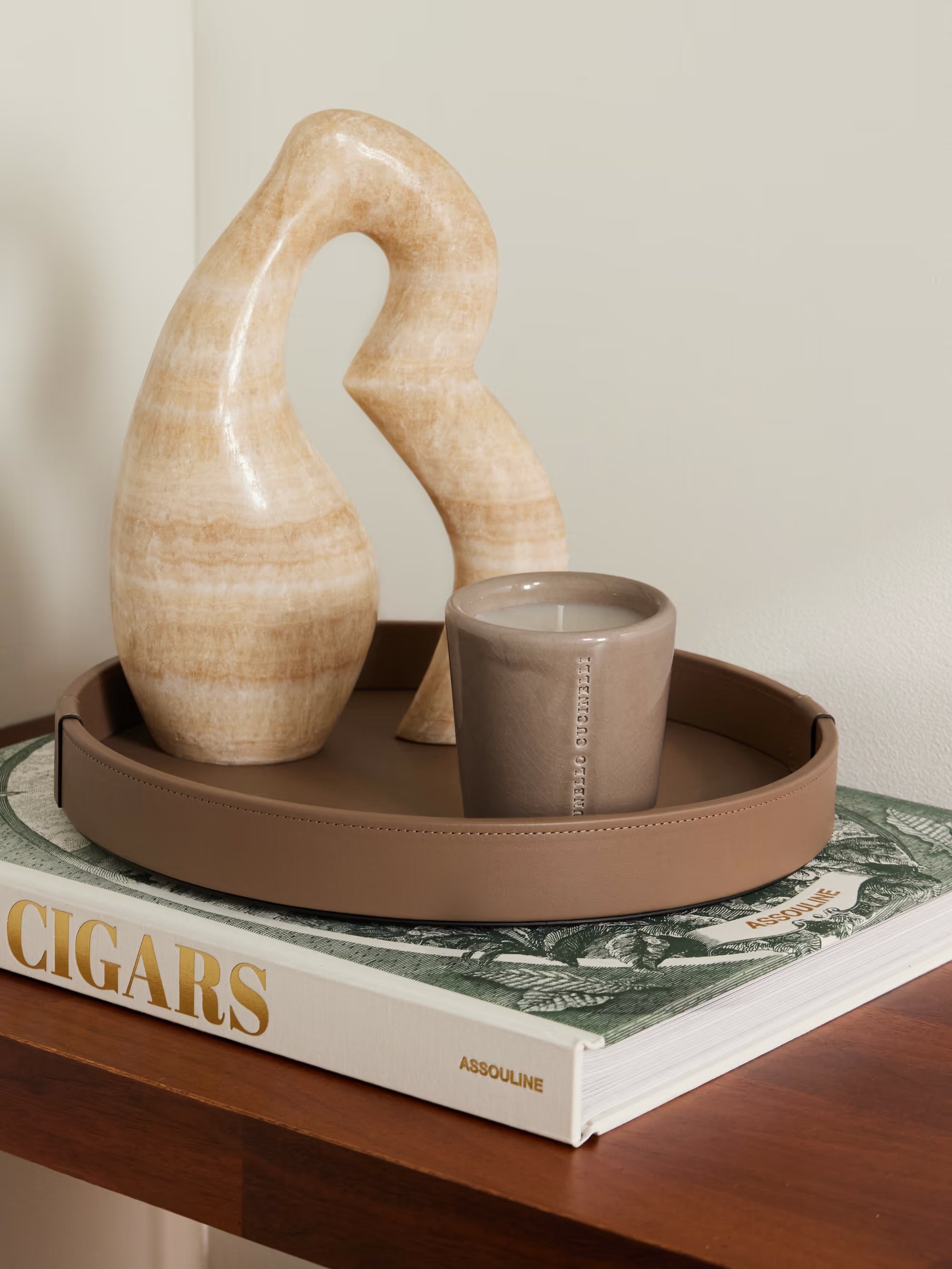 Brunello Cucinelli candle handmade ceramic vessel close-up showing brand stamp