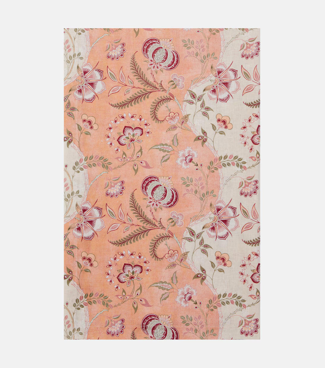 Floral patterned fabric swatch on a peach background