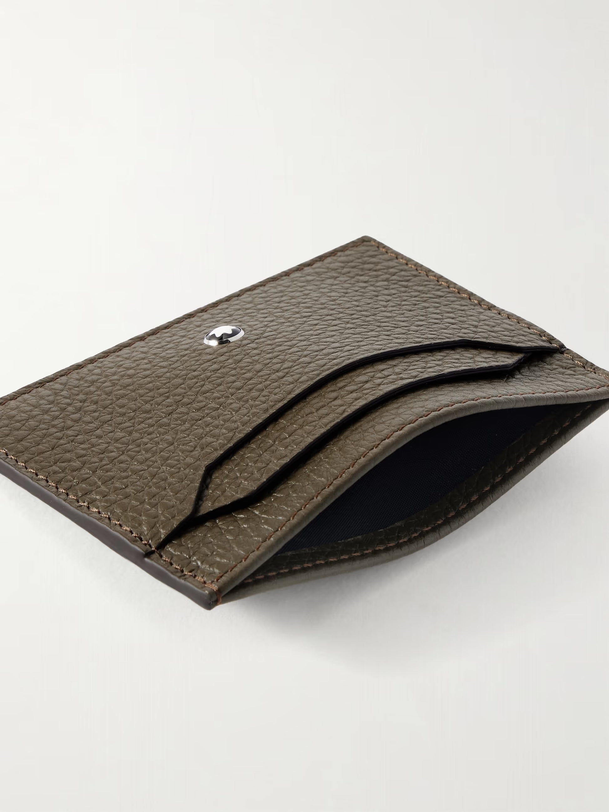 Montblanc leather card holder open view showing card slots and central bill pocket