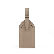 Smythson Panama leather luggage tag in sandstone — luxury travel gift for couples