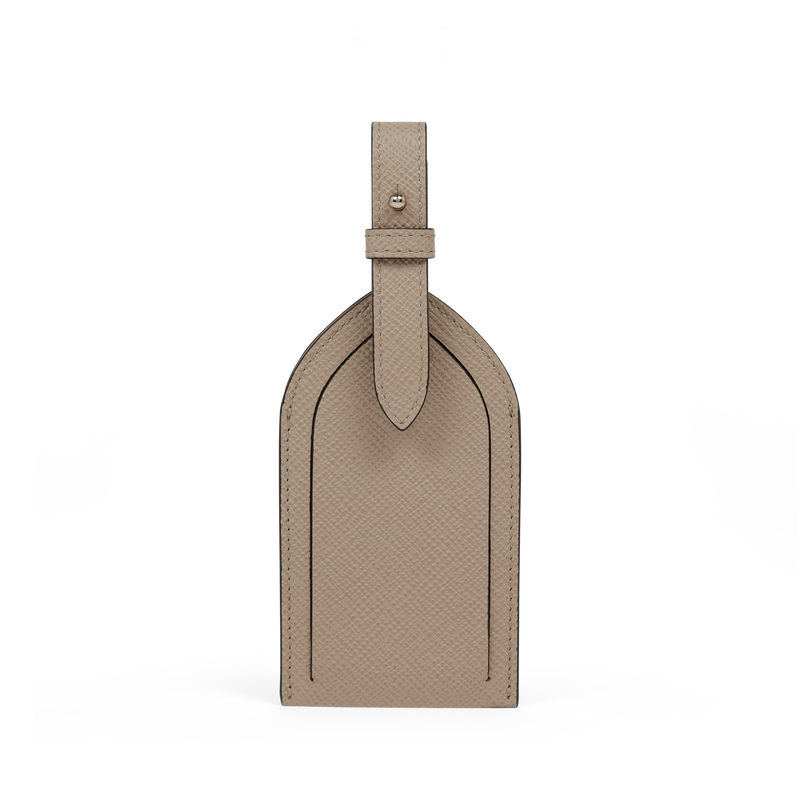 Smythson Panama leather luggage tag in sandstone — luxury travel gift for couples