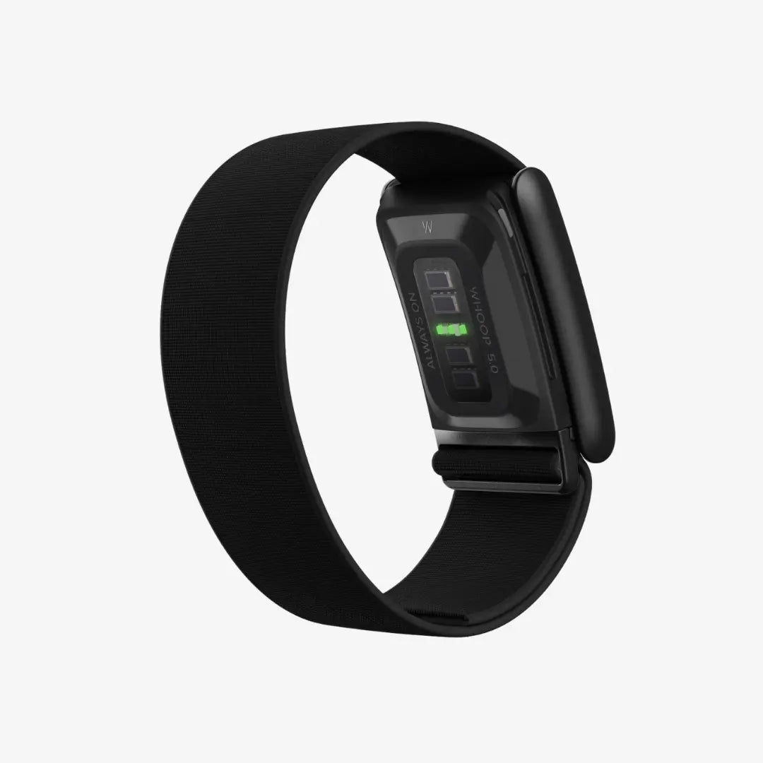 WHOOP 5.0 fitness tracker worn on wrist during workout showing no screen design